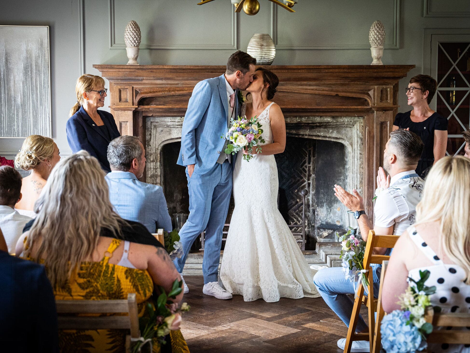A couple enjoy a kiss after saying I do at Solton Manor