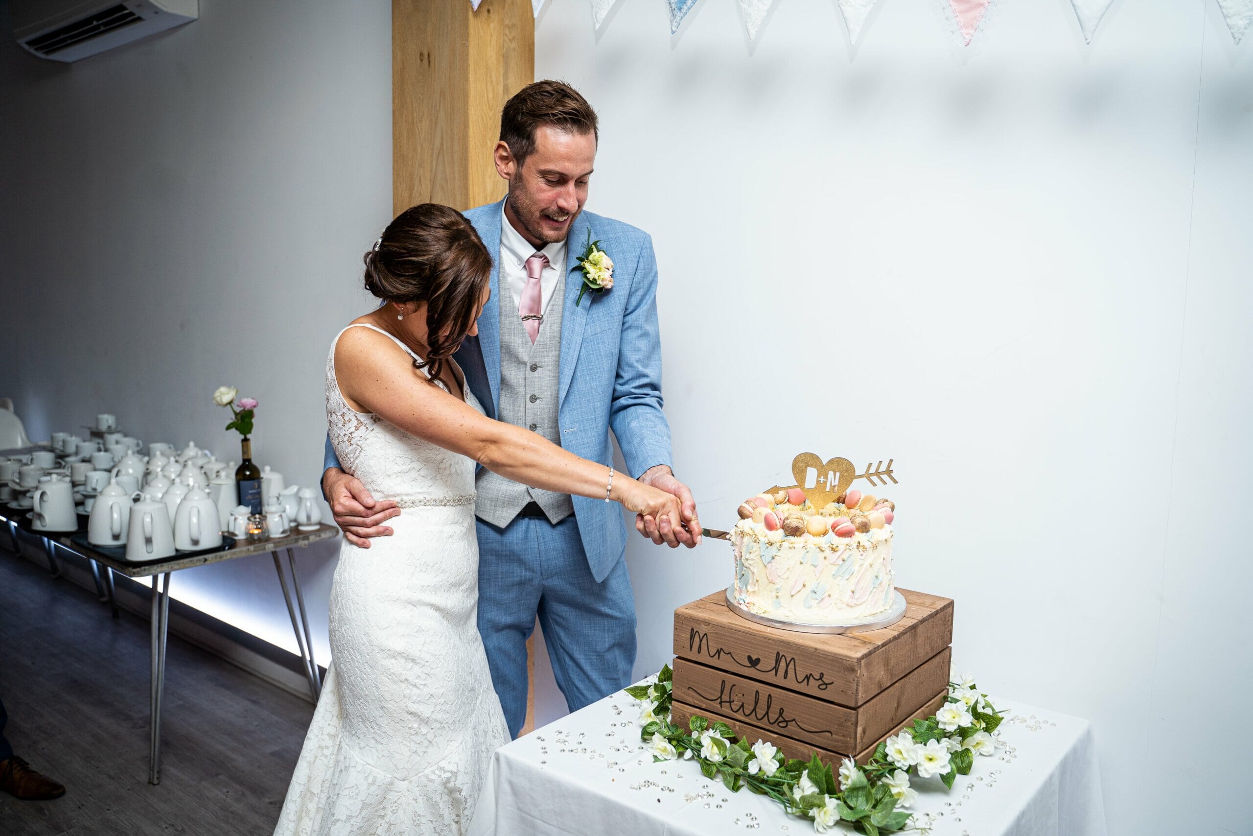 Textured wedding cake with heart topper