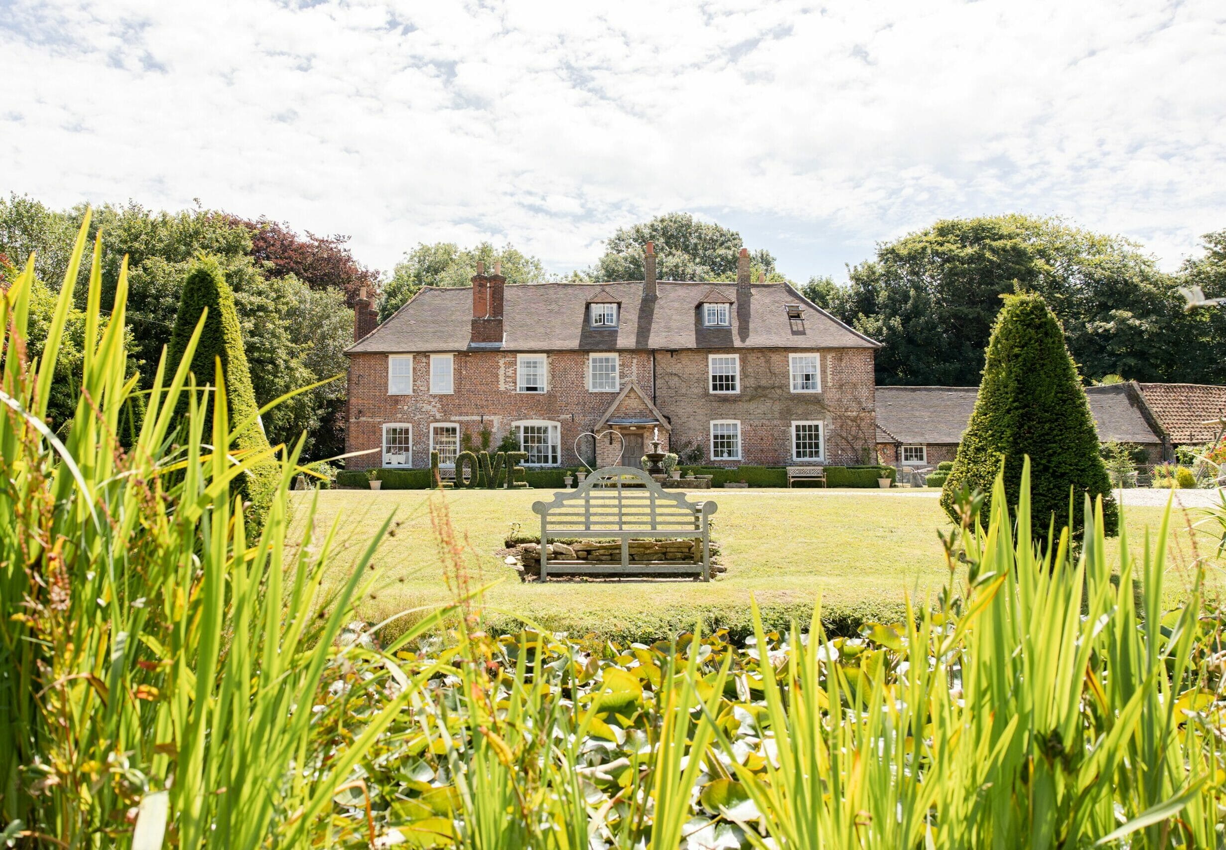 Solton Manor, a charming country house in Dover, features classic brickwork, red-tiled roof and surrounded by lush, manicured gardens. this historic venue provides the perfect backdrop for wedding in Kent.