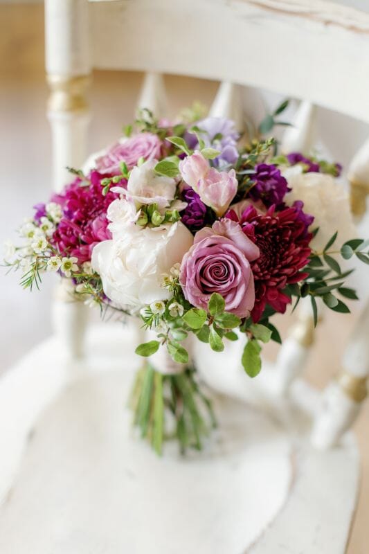 Kaitlyn's bouquet on a chair in kitchen of the manor house of Solton manor in Kent