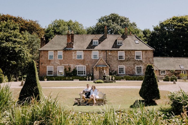 A just engaged couple in the grounds of Solton Manor, Dover, Kent, England