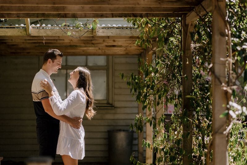 A just engaged couple in the grounds of Solton Manor, Dover, Kent, England