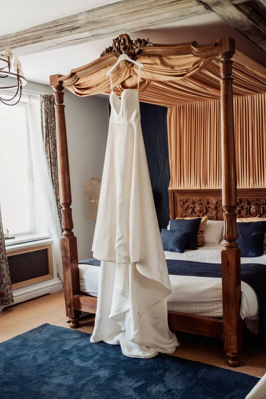 A real bride, Beth's wedding dress hangs in the Honeymoon Suite of Solton Manor, Deal, Kent, England